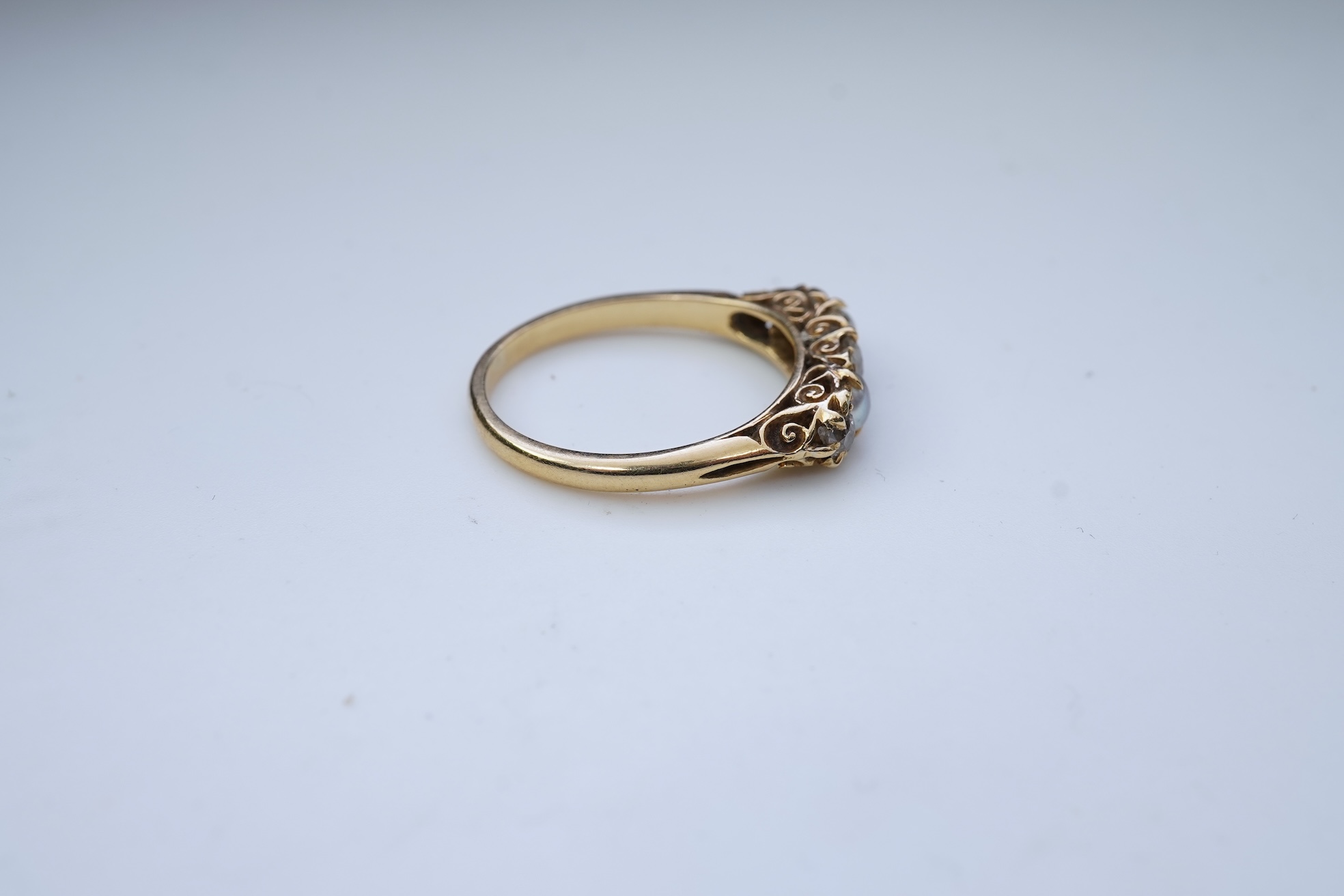 A five-stone pearl and diamond ring, early 20th century